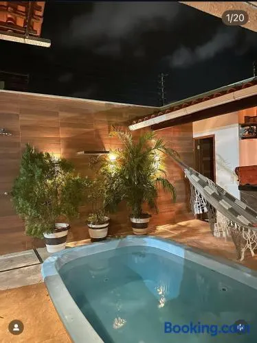 Aconchego Dourado I Alugue casa com piscina a 17min da praia - Image 1