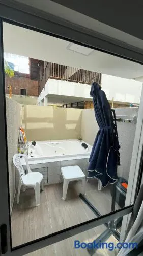 Flat com Hidromassagem Privativa e Piscina no Rooftop no Centro de Porto - Image 1