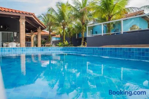 Casa com piscina aquecida, Condomínio a beira mar - Image 1