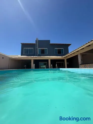 Casa com piscina, hidromassagem e vista para o mar - Image 1