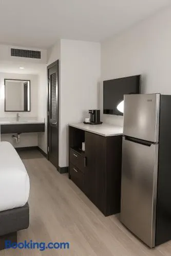 DELSOL Hotel Suites OKC Airport, Event Center, indoor Pool and Kids Arcade, 5 Min from Paycom, Fairgrounds - Image 1