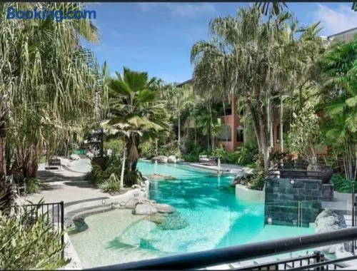 Tropical Resort with balcony overlooking pool - Image 1