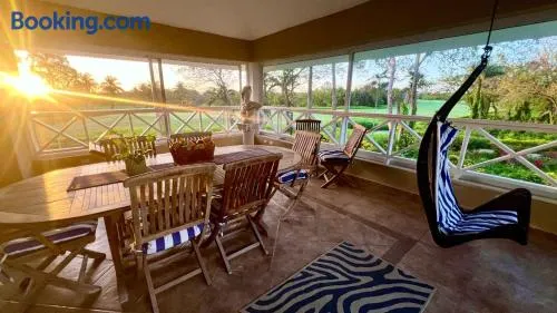 Elegant Golf Retreat with Jacuzzi Terrace - 3BR Apartment in Guavaberry Golf and Country Club - Gated Resort - Image 1