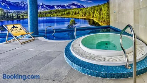 Apartamenty z basenem i saunami STONE HILL RESORT III VIP Centrum by Royal Aparts - Image 1