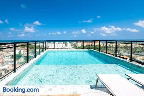Aptos completos em prédio com piscina e academia a 280m da Praia - CLFs - Image 1