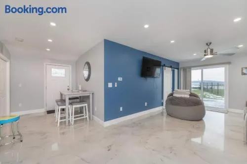Sunrise Bay 2 - Trendy lakefront home w/sunrise view, boat dock & walk to beach - Image 1