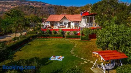 SaffronStays Olive Greens - Pool, Lawn & Glasshouse Escape - Image 1