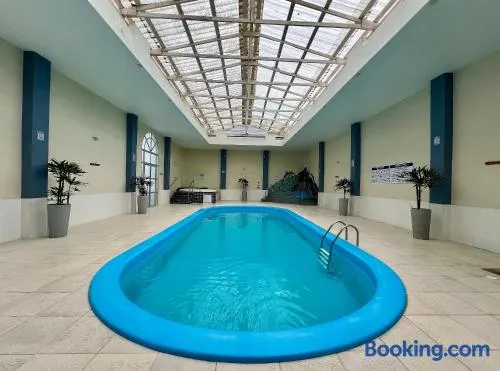 Apto Magnólia 50m da praia by Achei Floripa - Image 1