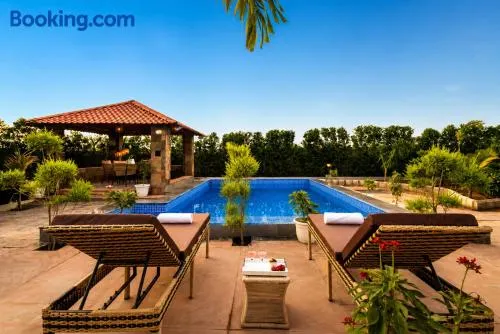 Alaya Stays Royal Green Farm Pet-friendly 2-BHK - Image 1