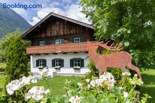 Forest Chalet, all famous ski areas around us, 15 min to city of salzburg, mountainview, panorama sauna, bath whirlpool, fire pit in garden up to 10 p - Image 1