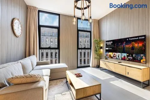 Big Studio Apartment in Al Mamsha Sharjah - Luxe Minimalist - Image 1