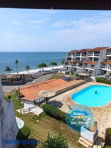 Apartamento 2 quartos térreo com passarela exclusiva para orla - Image 1