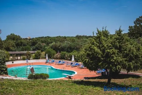 Onde di Baja - L'appartamento con piscina condominiale a Baja Sardinia - Image 1