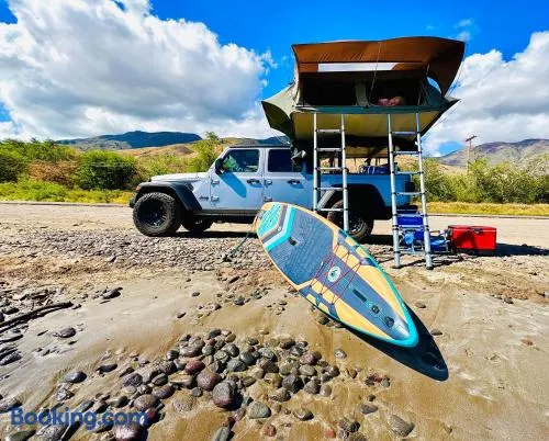 Embark on a journey through Maui with Aloha Glamp's jeep and rooftop tent allows you to discover diverse campgrounds unveiling the island's beauty from unique perspectives each day - Image 1