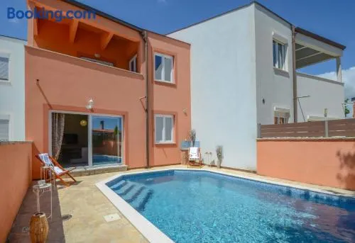 Holiday house with swimming pool Iva - Image 1