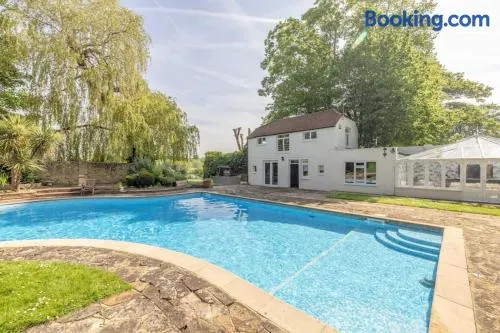 Riverside Gem, 2 Homes, Heated Pool, Hot Tub & Sauna - Image 1