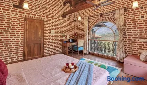 SaffronStays Brick Bastion - Image 1
