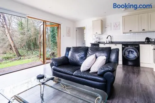 Tranquil Rivereside Retreat Cosy Chalet - Image 1