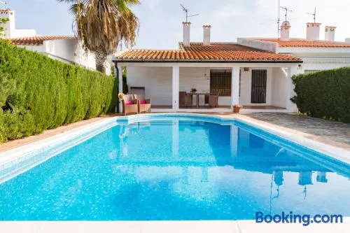 Araceli - Chalet en Riumar con piscina privada, jardín y barbacoa - Deltavacaciones - Image 1