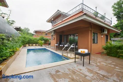 SaffronStays Dhyana - 3BR pet-friendly pool villa with Wi-Fi, indoor games and riverside trails in Wadas gated estate - Image 1