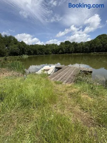 French farmhouse with lake - Image 1