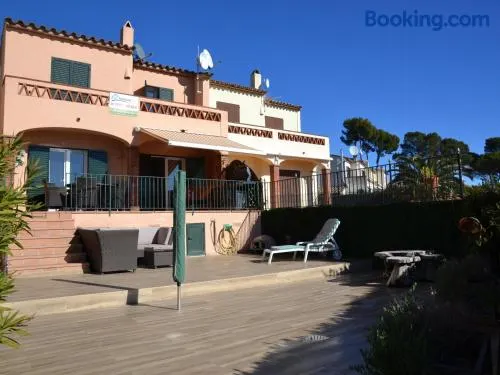 Casa bien cuidada con piscina comunitaria, terrazas y cerca de la playa en L'Estartit - ES-323-42 - Image 1