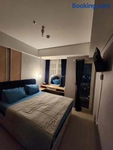 Studio Cozy Apartemen South Surabaya at Wonokromo - Image 1