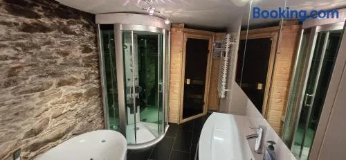 Fewo Brettmühle, Ferienwohnung im Erzgebirge mit einzigartigem Wellness-Badezimmer, Sauna und Kamin - Image 1