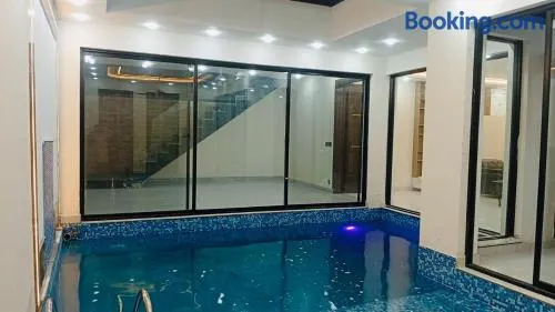 Luxury DHA Villa 2 BHK with tv lounge and Paid Private Indoor Pool - Choose high speed internet rate to include pool - Image 1