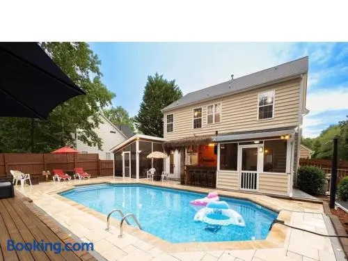 Tropical Oasis with Tiki Bar, Firepit, Seasonal Pool - Image 1