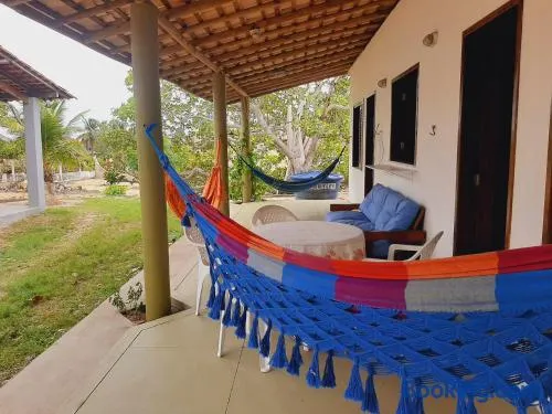 CHALE PERTO DA PRAIA COM DUAS SUITES E VARANDAO - Image 1