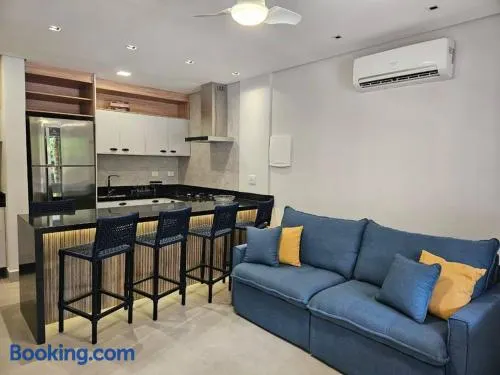 Flat na Riviera de São Lourenço com serviço de hotelaria - Image 1