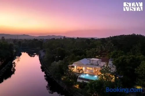 StayVista at Stories by the River with Pool & Bar - Image 1