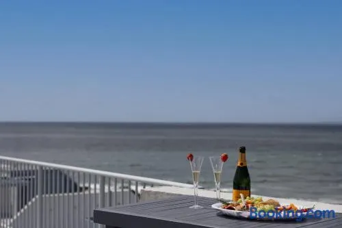Coastal Comfort with Ocean Views from Shared Rooftop and Separate Pool - Image 1