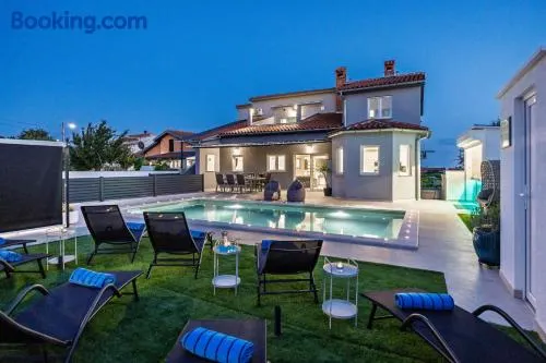 Villa Spa Otium for 8 people with 32 m2 heated pool, outdoor cinema, kids playground & spa area - Image 1