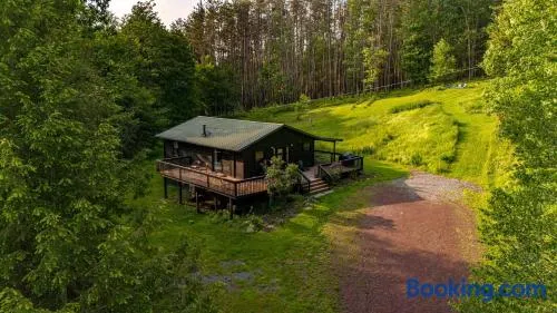 Zenwood Manor - Modern Cottage with Woodstove and Firepit - Image 1