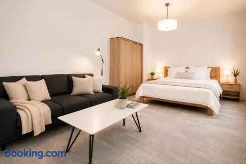 ALURE RESIDENCES 2 - 24h self check-in & private parking next to the apartment building included, CITY CENTER right on SNP Square in a quiet passage, new building, best deal in town - Image 1