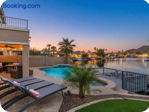 Waterfront Home with Heated Pool & Game Room - Image 1