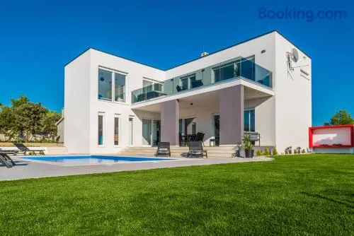 Villa con barbacoa, terraza y sauna | Vistas al agua - Image 1