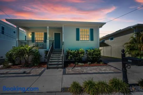 Tropical 3BR Bungalow near Sponge Docks, Downtown, Pinellas Trail, & Pickleball - Image 1