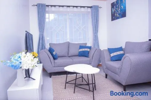 Marvel Homes - Pumzika Modern 1BR Fast WiFi Balcony Near Town Perfect for Work & Stay - Image 1