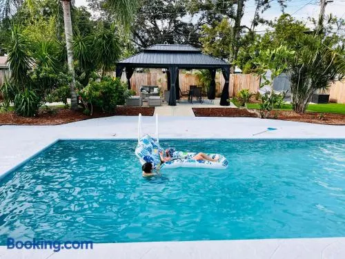 Tropical Oasis near Beaches! 4BR, Heated Pool, Fire Pit, Grill and More - Image 1