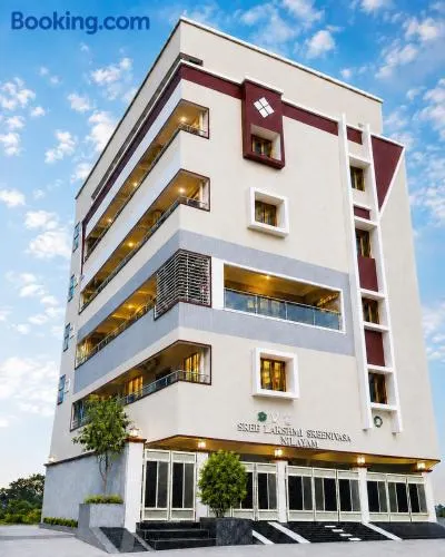 SLS Homestay - Luxury AC Service Apartments 1BHK, 2BHK, 3BHK - Direct Flyover to Alipiri Tirumala Gate - Walk to PS4 Pure Veg Restaurants, Supermarkets - Near to National Highway & Padmavathi Amma Temple - Modular Kitchen, Living room -Free Superfast Wifi - Image 1