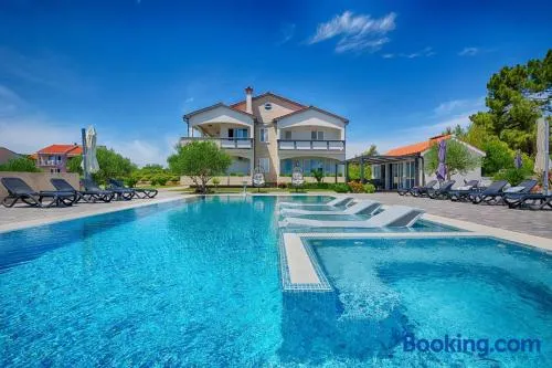 Family-friendly apartments with swimming pool Vir - Kozjak, Vir - 18542 - Image 1