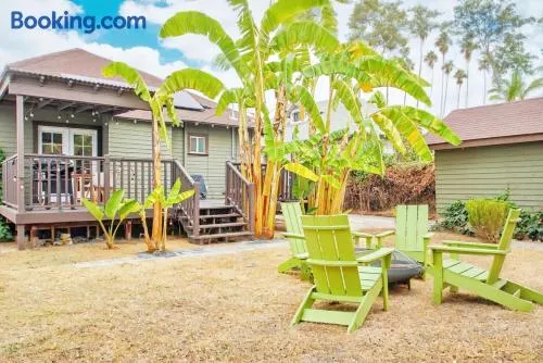 Inviting 3BR Home with Porch & Greenery - Image 1