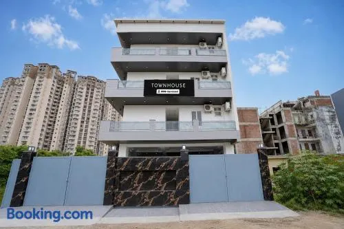 Hotel Aroha A Corporate Suites Near Botanical Garden Metro Station - Image 1