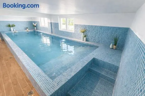Family home with indoor pool & spa sleeps 22 - Image 1