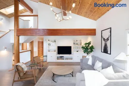 White Gold Chalet - Spacious Family-Friendly Chalet, Hot Tub, Mountain Views, Log Fireplace - Image 1