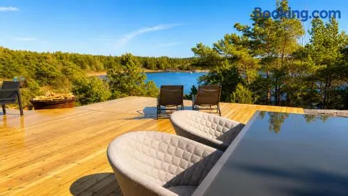Modern Scandinavian cabin by the sea, calm, private setting, 50m to ocean - Image 1