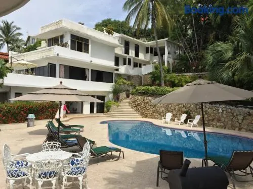 Villa Palmitas acogedor departamento nivel piscina gigante jardines - Image 1